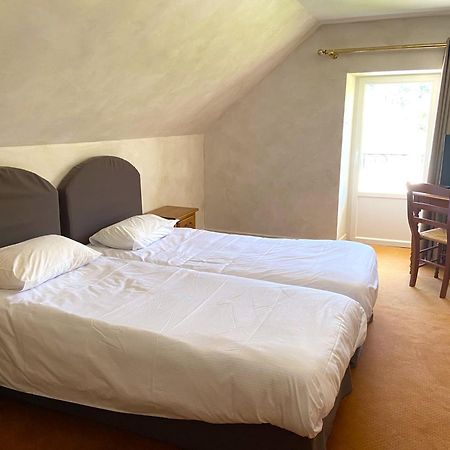 Hotel Beauséjour Vic-sur-Cère Habitación foto